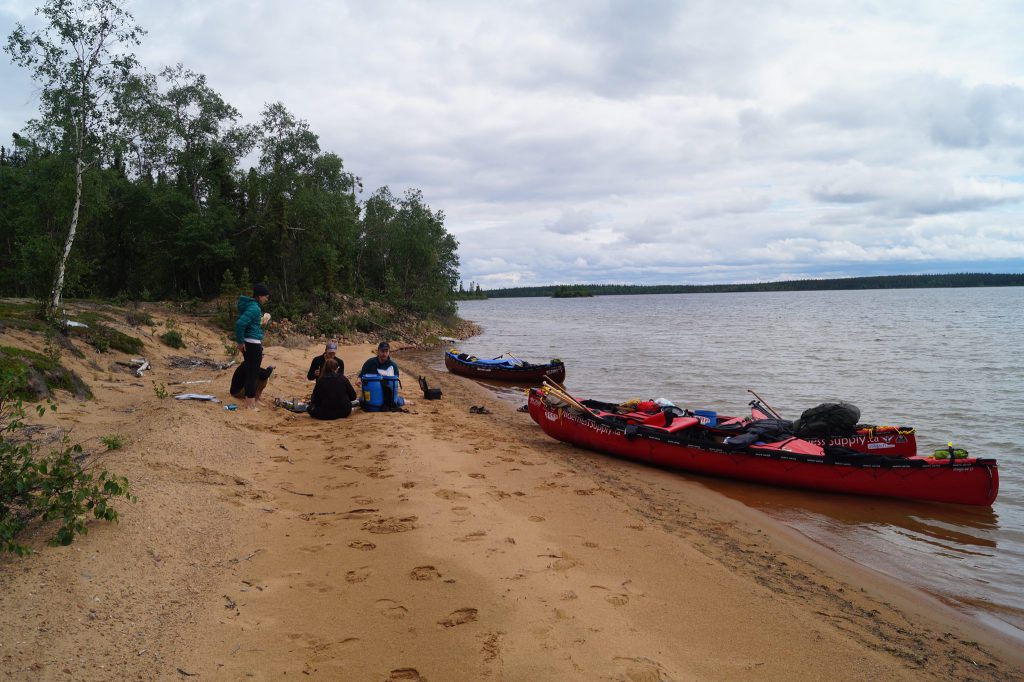 The expedition rests on an esker.