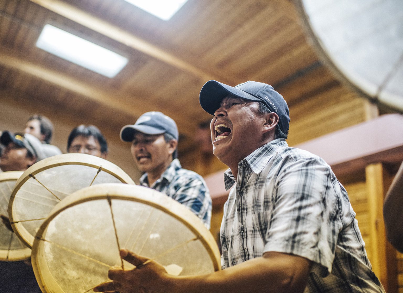 Gordon Taniton and other drummers celebrate Déline's UNESCO status