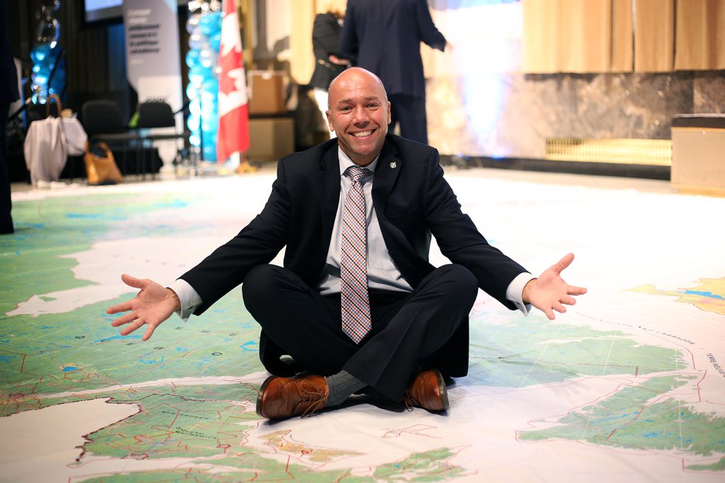 Andy Fillmore MP on CPAC Route 338 giant floor map