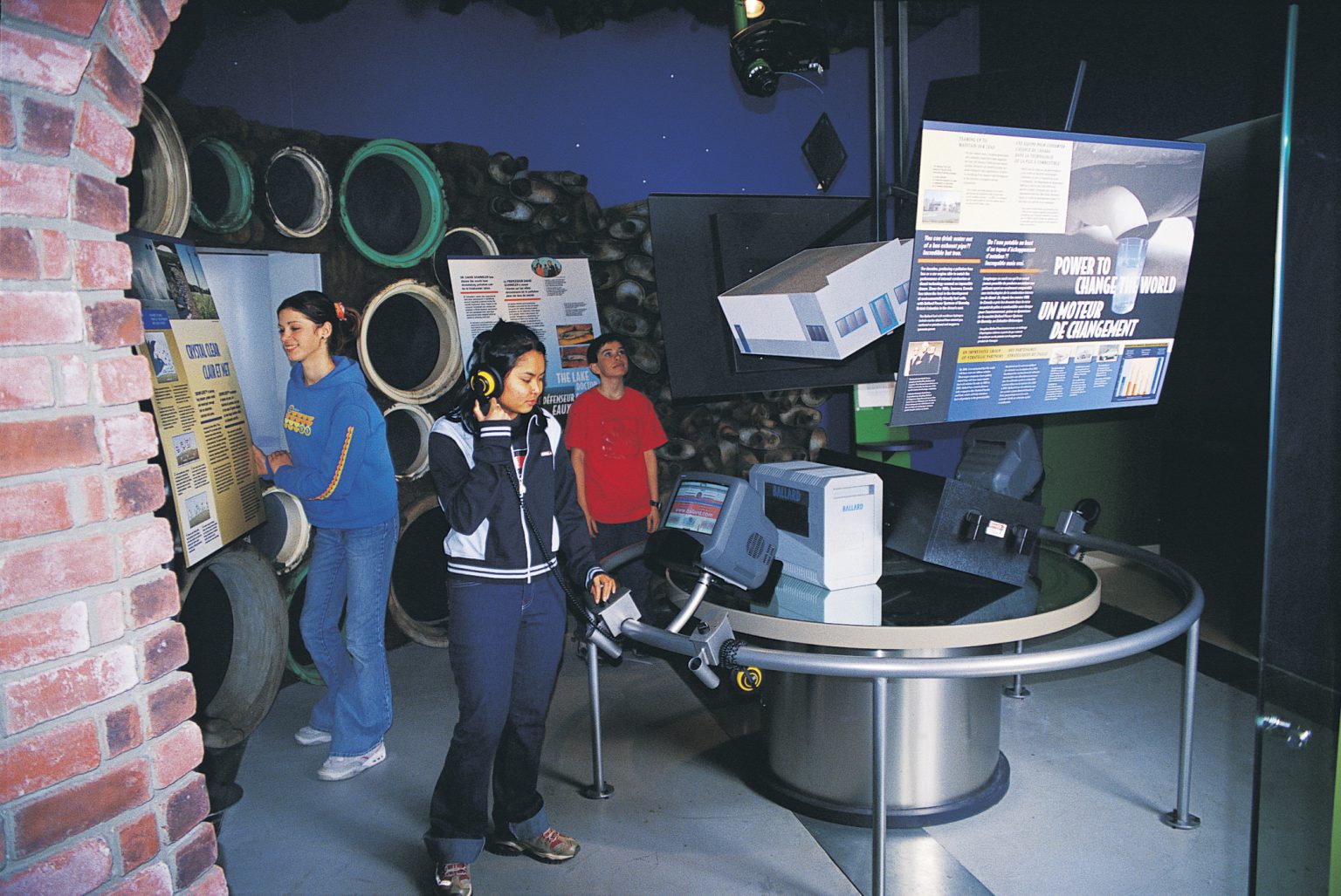 Visitors explore an exhibit at the Canada and the World Pavilion 