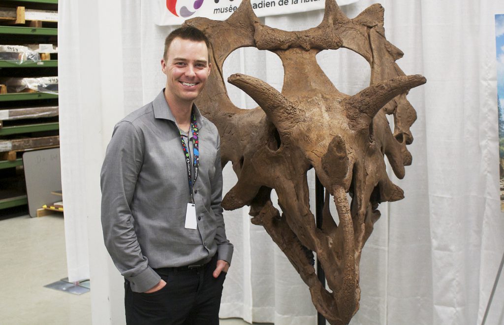 Dr. Jordan Mallon of the Canadian Museum of Nature poses with the skull of 