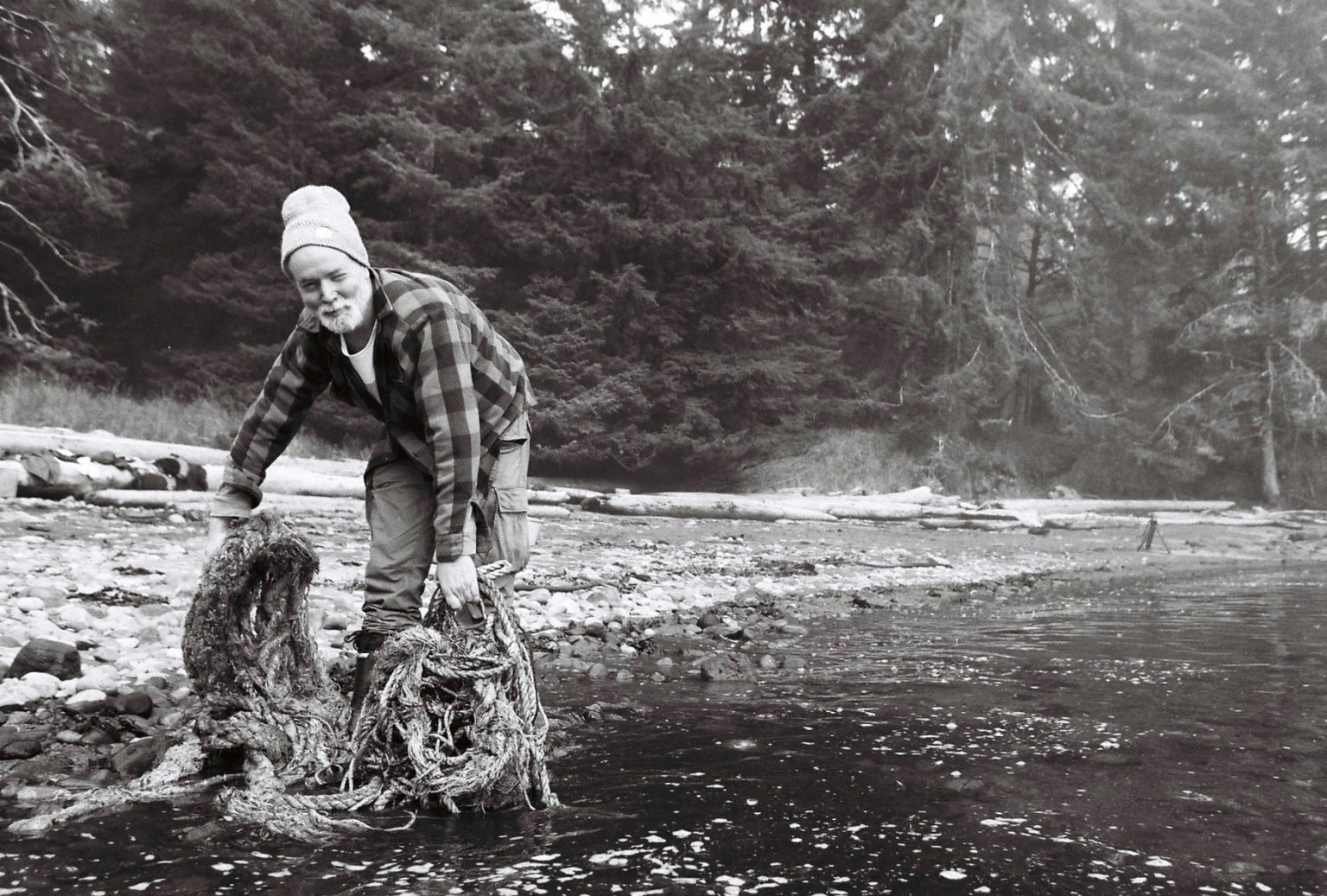 artist Douglas Coupland collects discarded fishing rope from a beach in Haida Gwaii