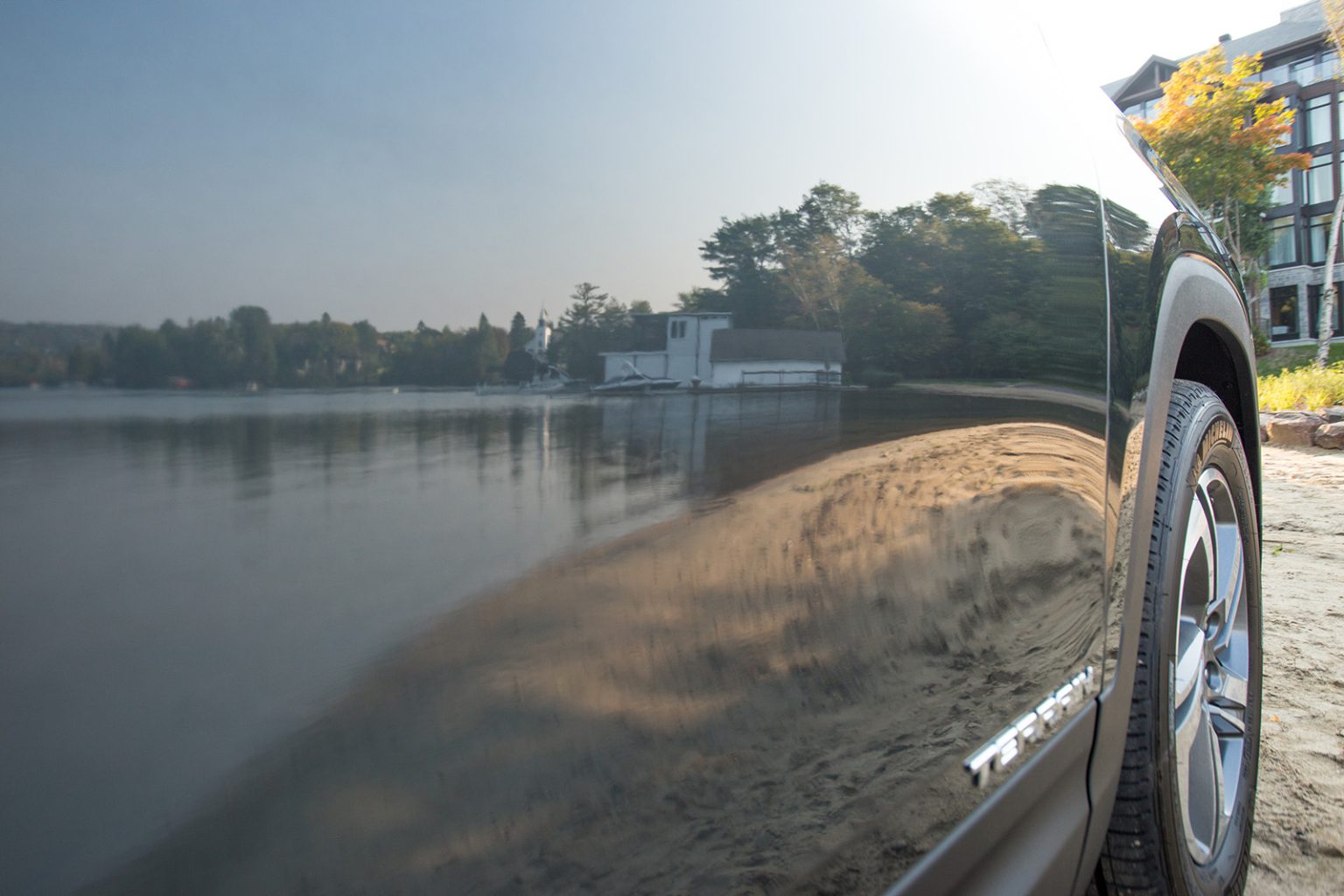 lac beauport reflected in GMC Terrain body