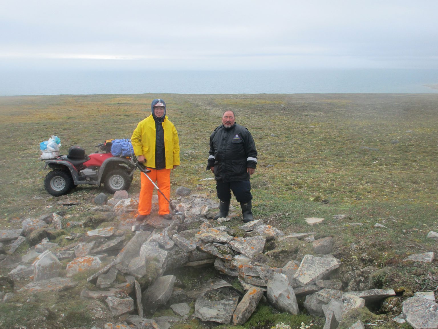 Jamie and Louie with the remains of Rasmussen's stone house at Peabody Point