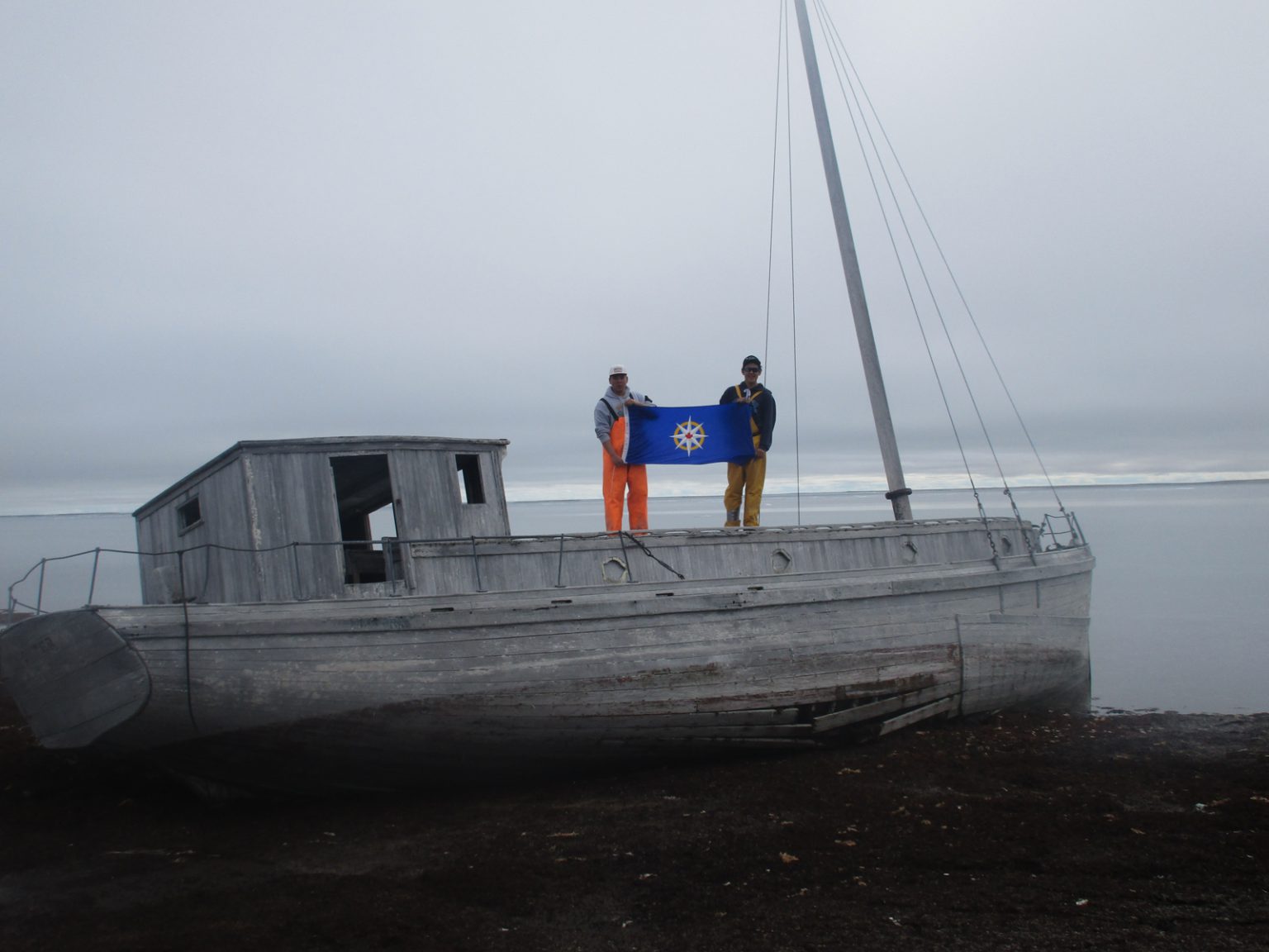 Jamie and Michael with the remains of an HBC supply boat