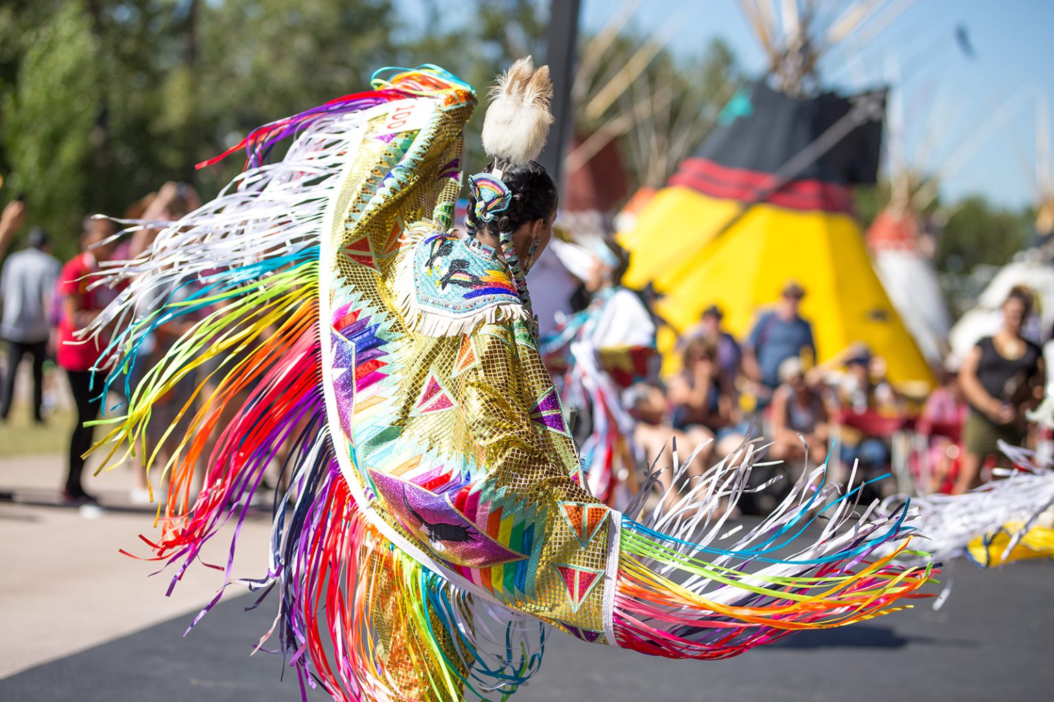 A fancy dancer performs in the Indian Village at the 2017 Calgary Stampede.