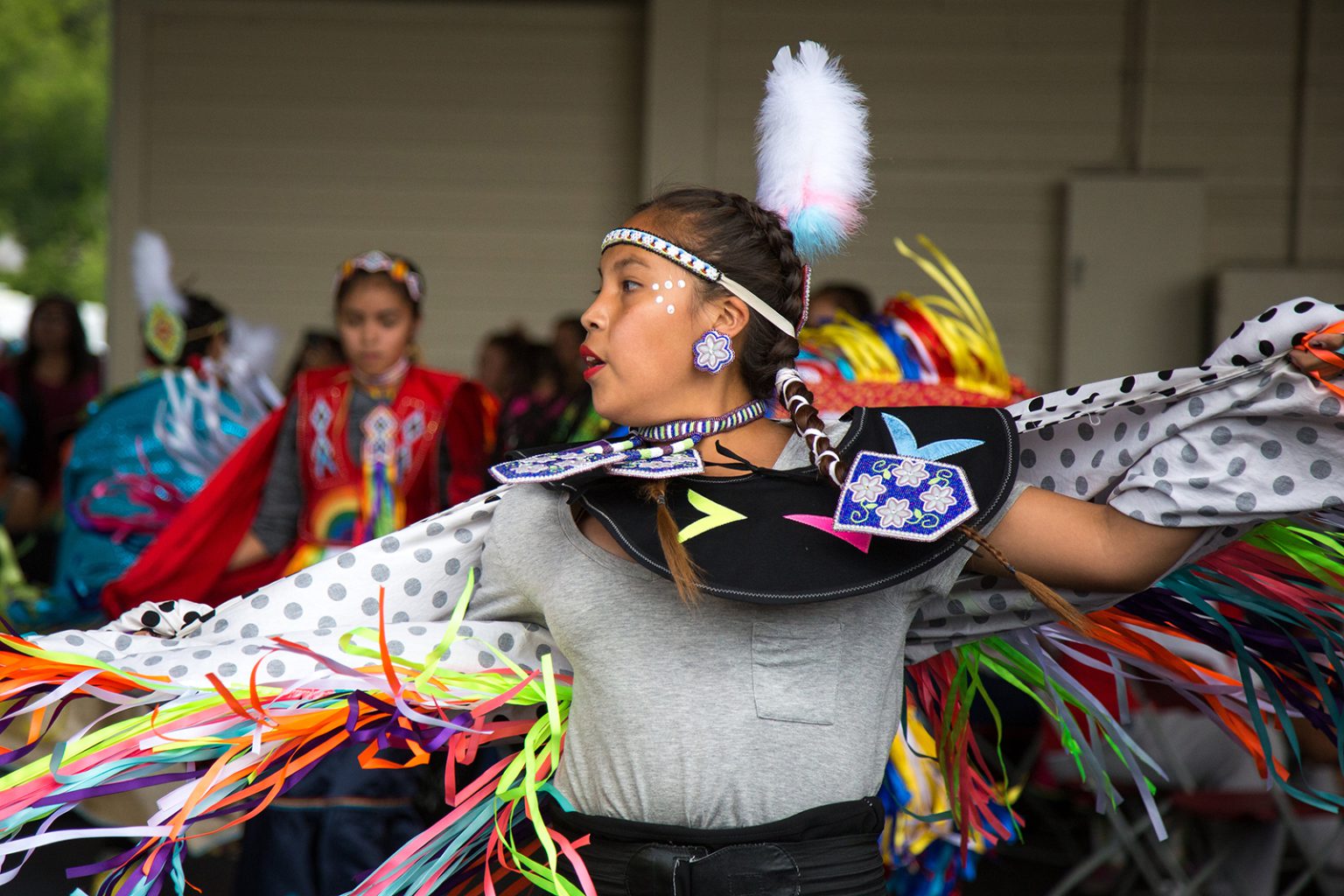 A fancy dancer performs in the Indian Village at the 2017 Calgary Stampede