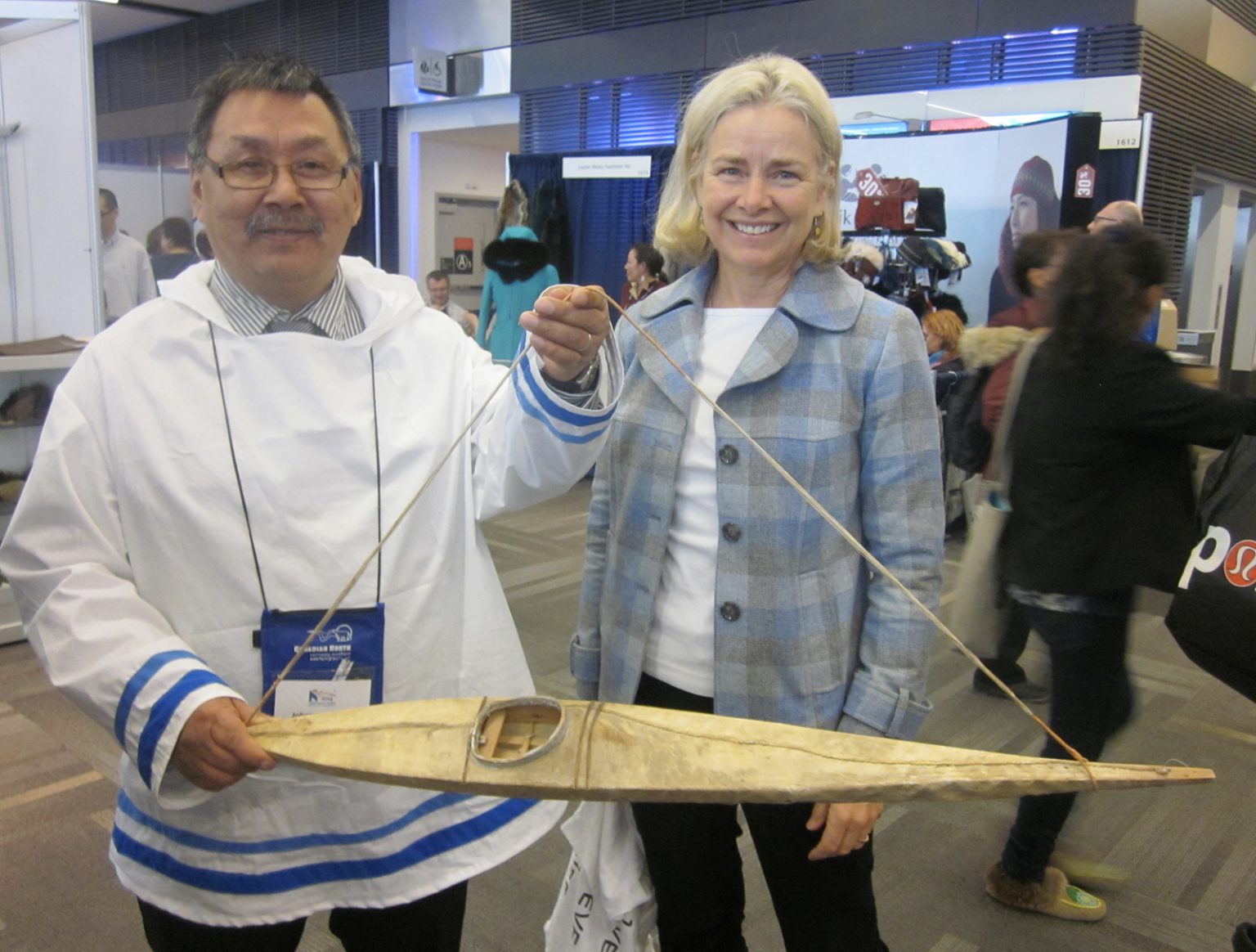 Johannes Lampe, President of the Nunatsiavut Government, and Rozanne Junker with Renatus' kayak 