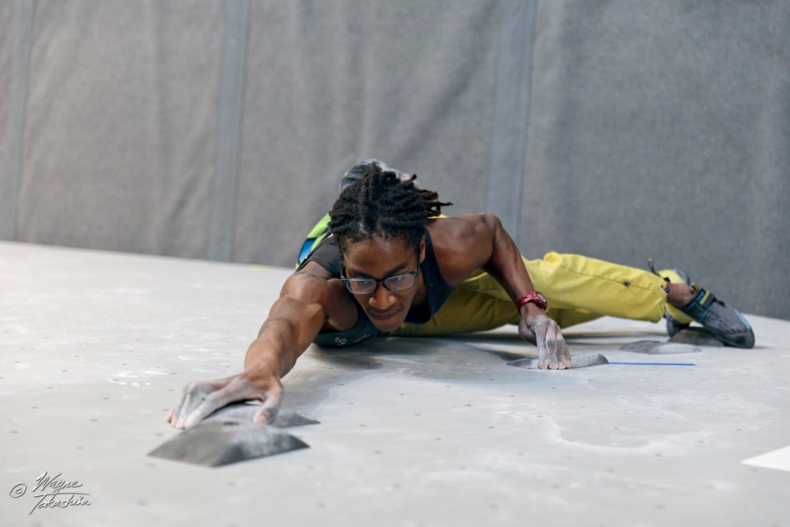 Climber on bouldering wall