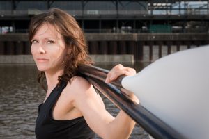 mylene paquette holding a paddle