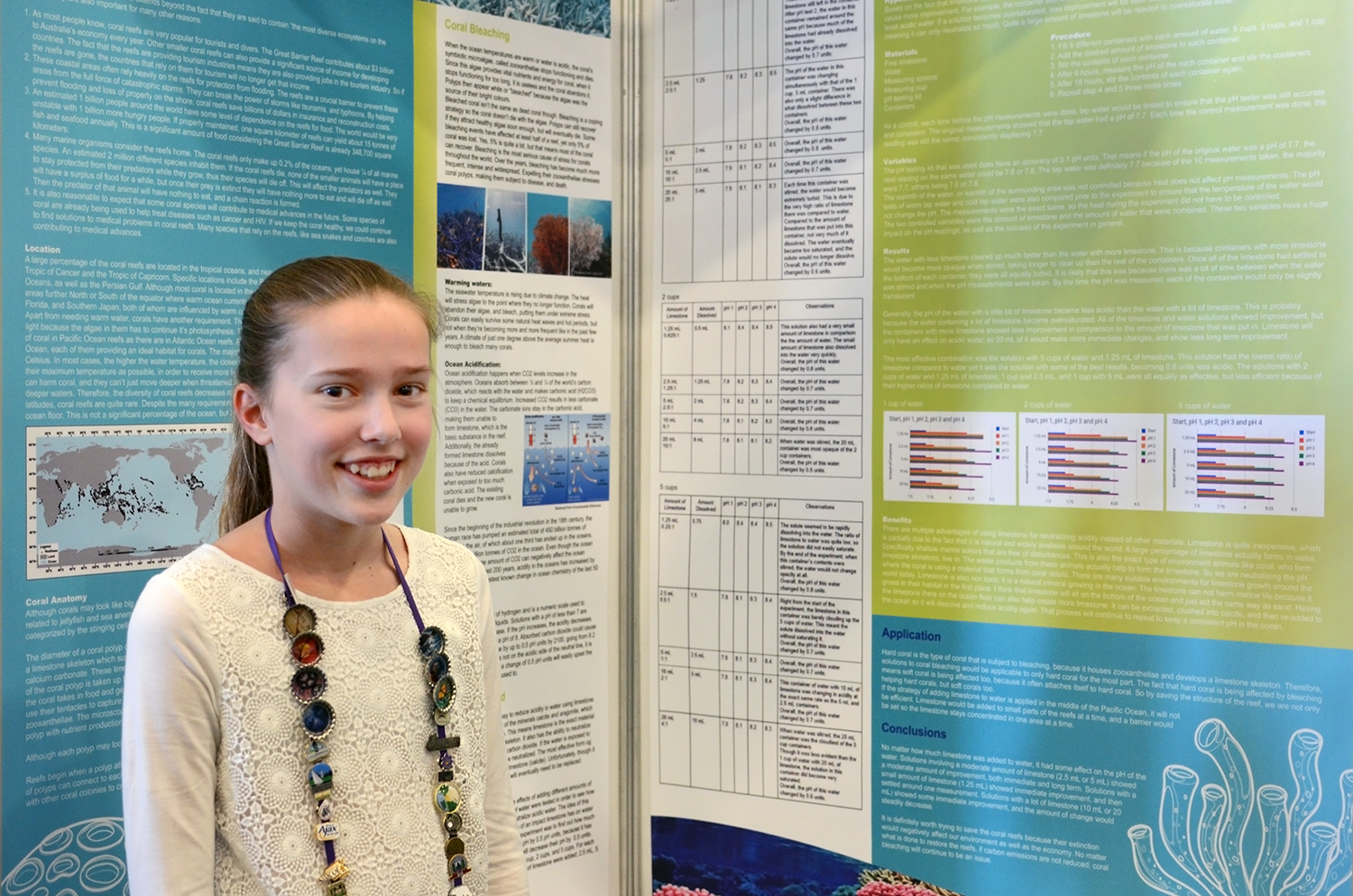 Nikki Van Schaik with her project on coral bleaching