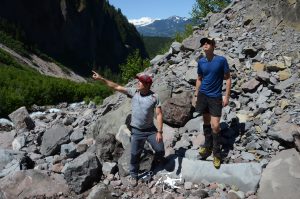 Volcanologists Steve Quane and Alex Wilson get ready to launch a drone to survey a volcanic dam