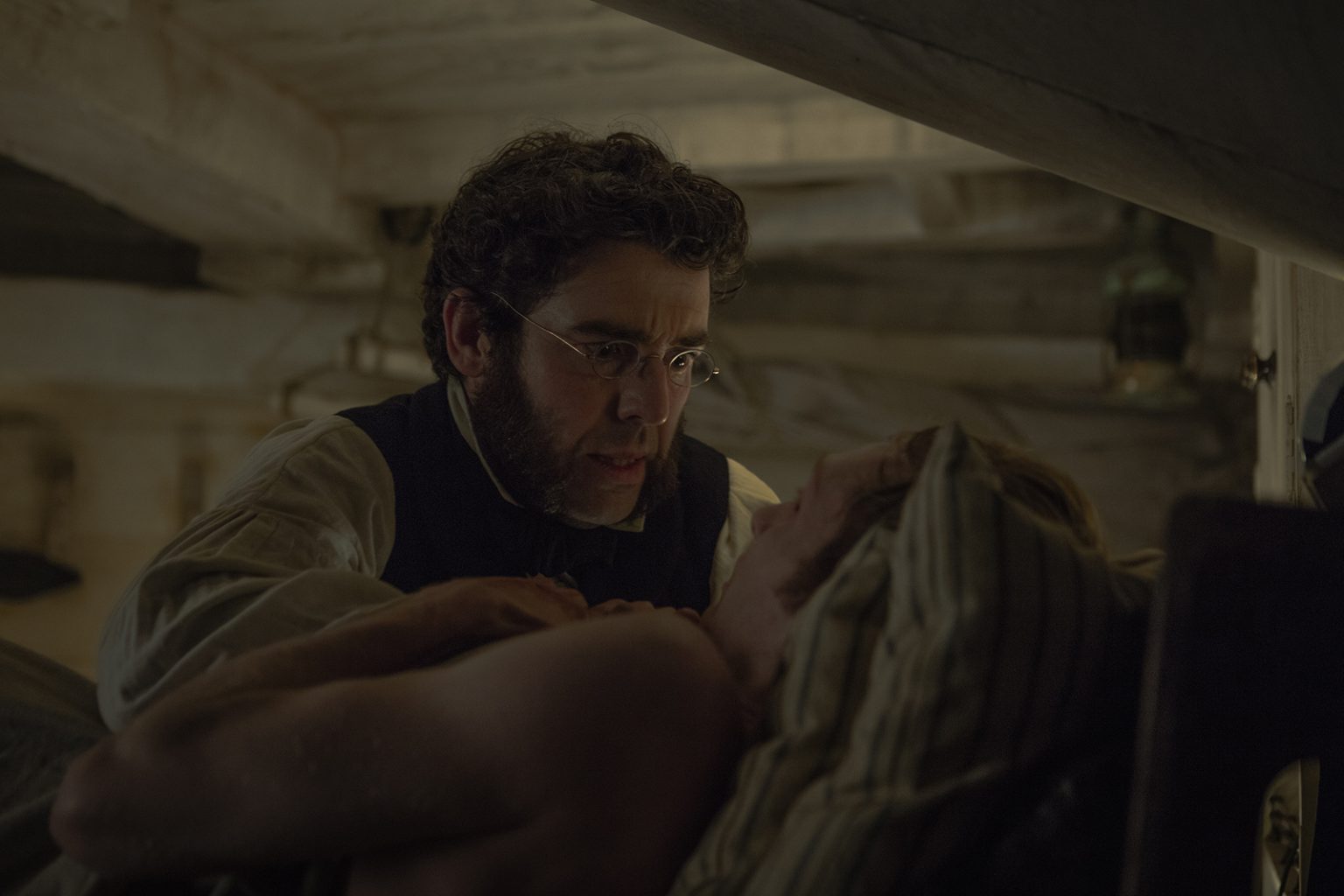 Paul Ready as Dr. Henry Goodsir, Alfie Kingsnorth as David Young - The Terror _ Season 1, Episode 1 - Photo Credit: Aidan Monaghan/AMC