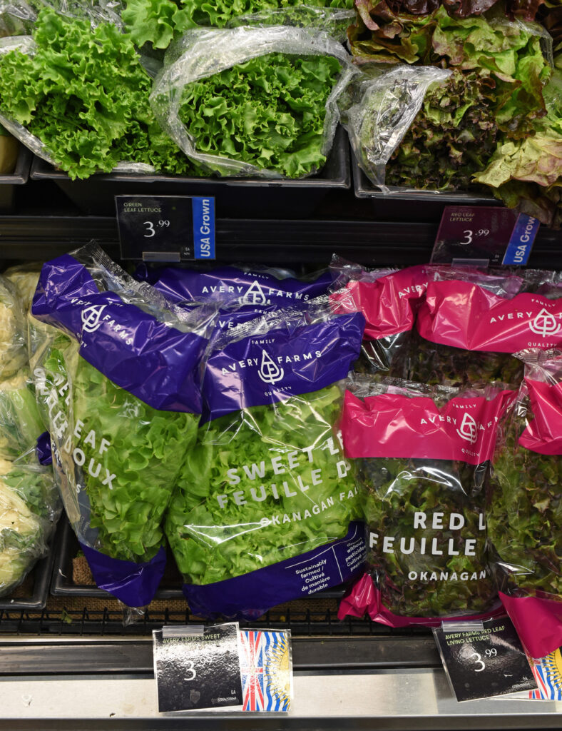 British Columbia-grown lettuce is pictured under lettuce grown in the U.S. on a grocery story shelf