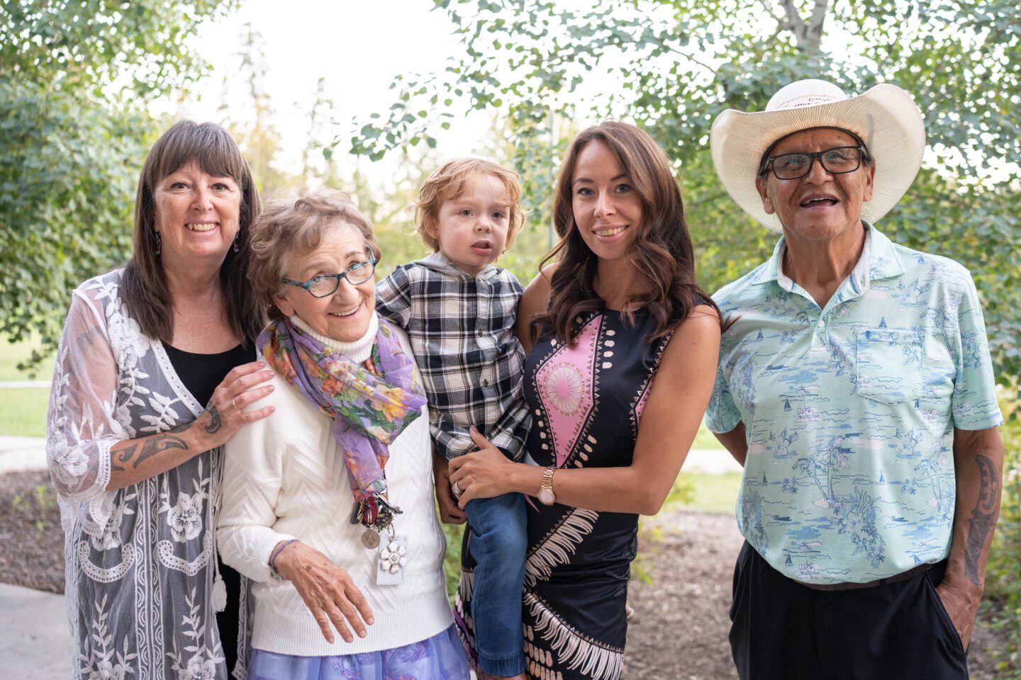 Maggie poses with Charlene and Wilson Bearhead, and their daughter Seneca Dueck and grandson Bud.