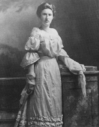 A portrait of Isabella Preston wearing a long dress in 1900